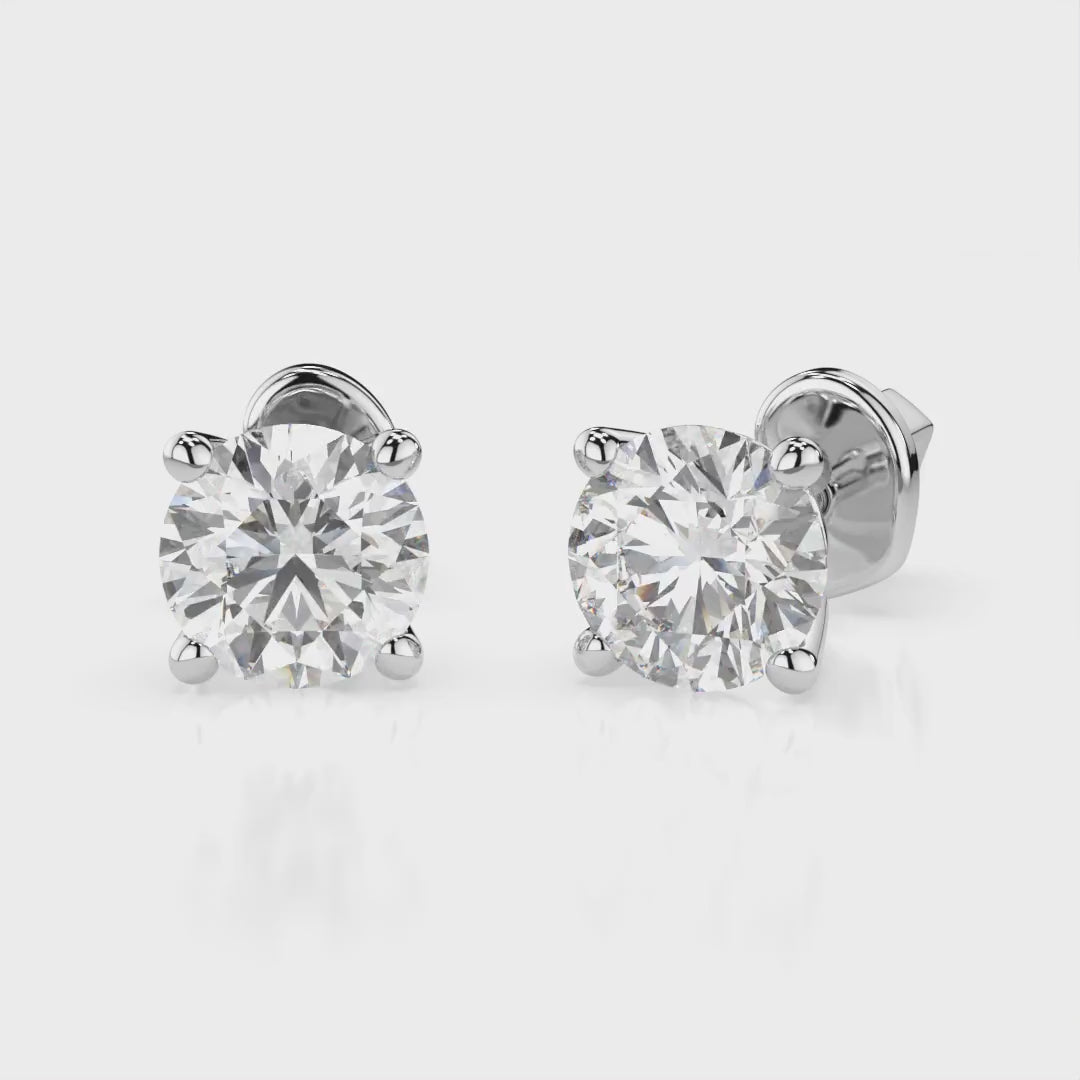 Diamantni uhani iz belega zlata z enim diamantom Solitaire