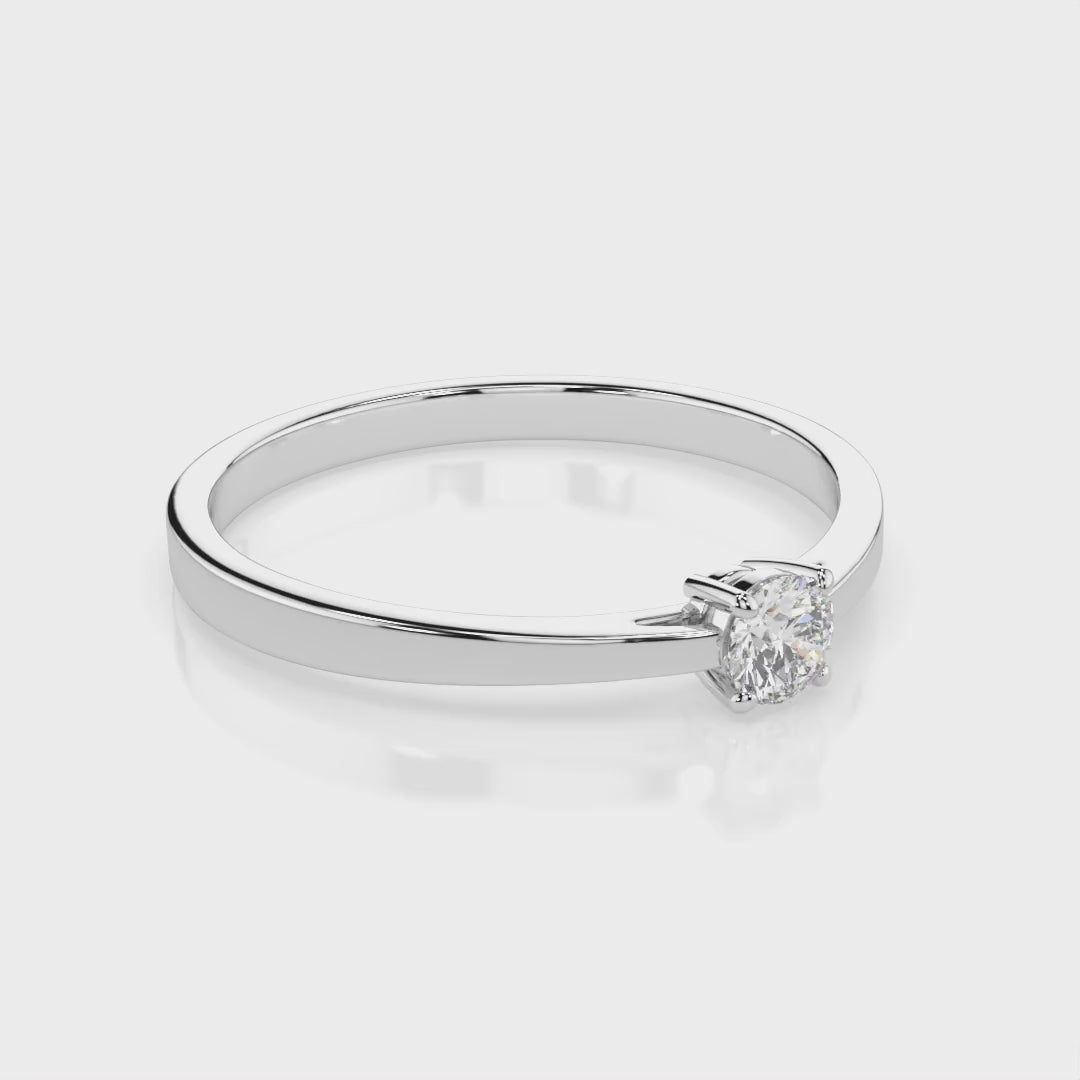 Zaročni prstan iz belega zlata z enim naravnim diamantom